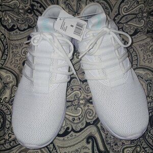 Women's white Puma tennis shoes size 8